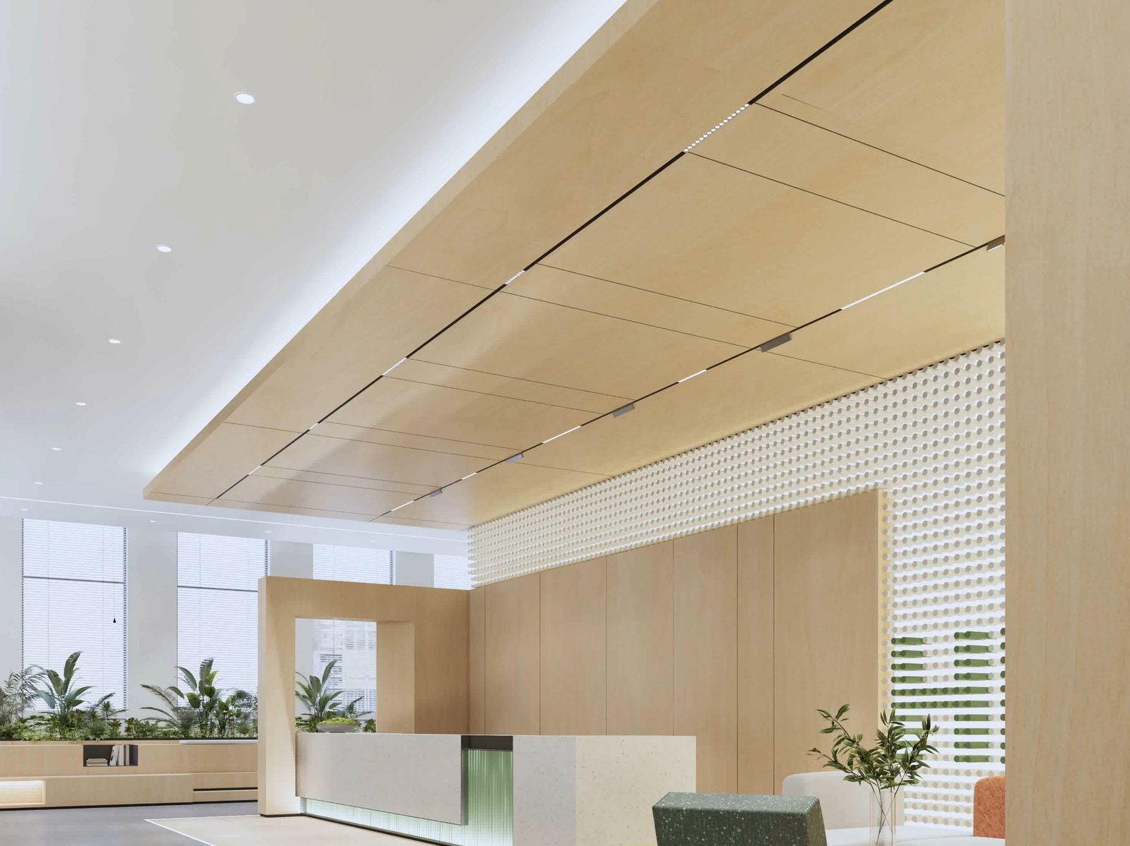 Reception area with light timber walls, terrazzo desk, integrated lighting, and biophilic greenery in a renovated Hong Kong office