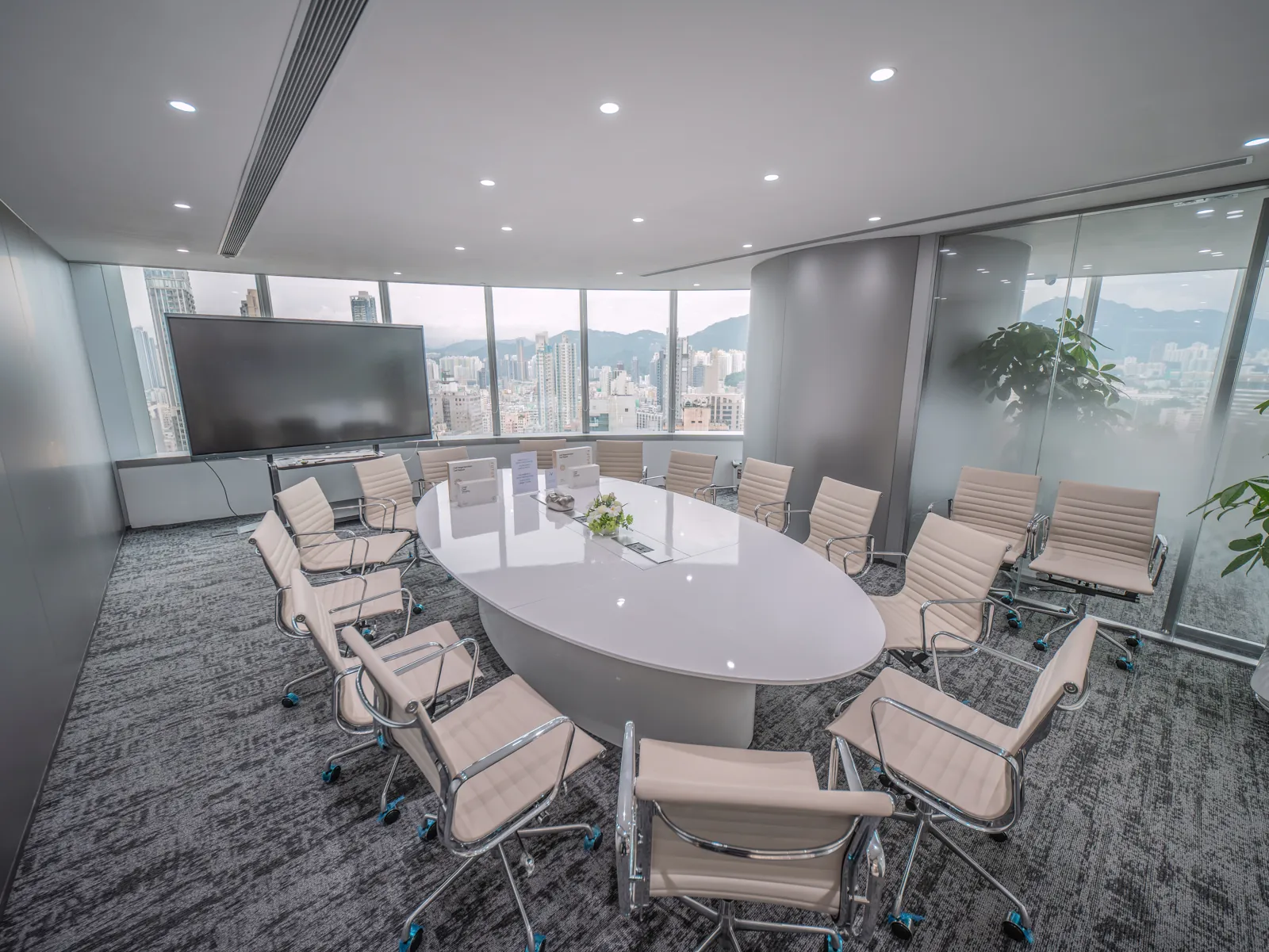 Executive boardroom with AV wall at the 2026 healthcare headquarters project — design, MEP and joinery coordinated by a single design-build team